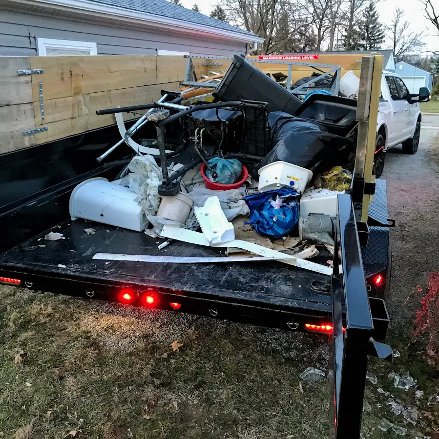 Roll-off dumpster delivered to a residential driveway in Stoughton