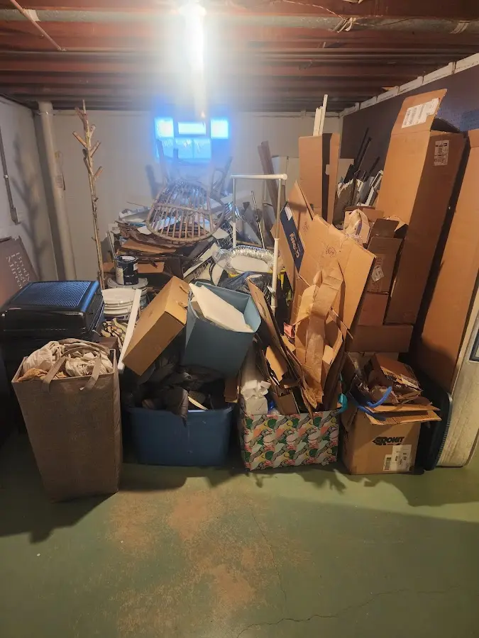 Roll-off dumpster container at job site for 15 Yard Dumpster Rental in Stoughton